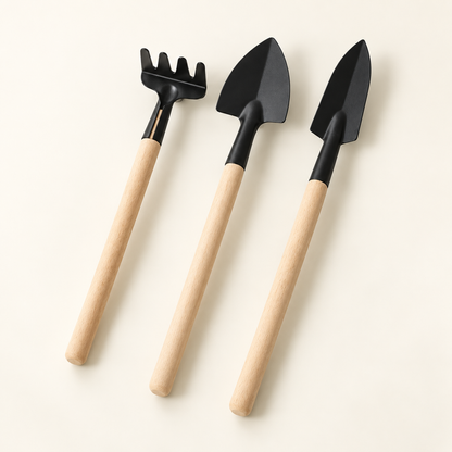 Slim-Handle Mini Garden Tool Set — three-piece mini garden tool set on a warm ivory background